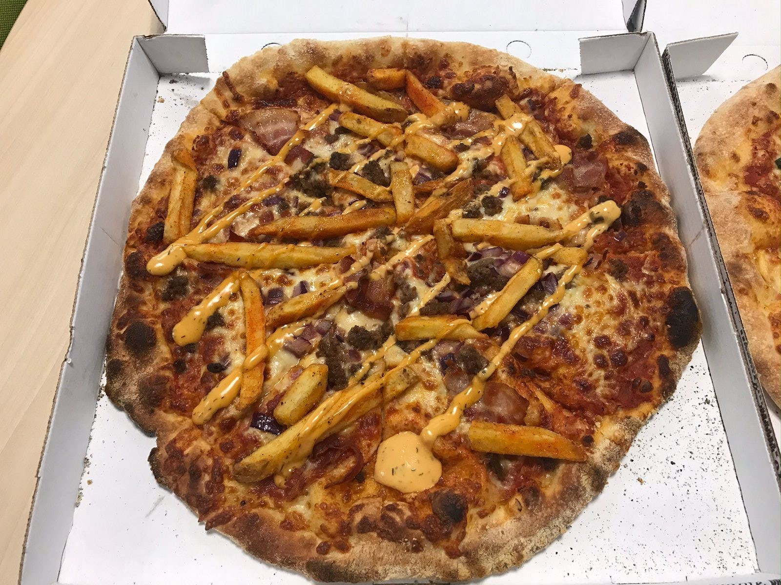 The cheeseburger pizza was tasty, despite being something we havent tried before