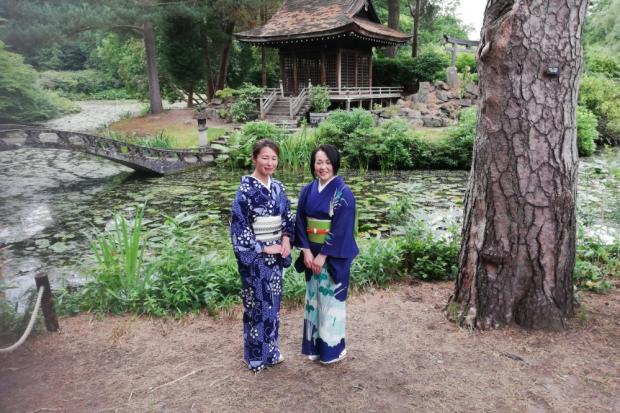 Japanese ladies in kiminos welcome the Matsuri Festival at Tatton Park