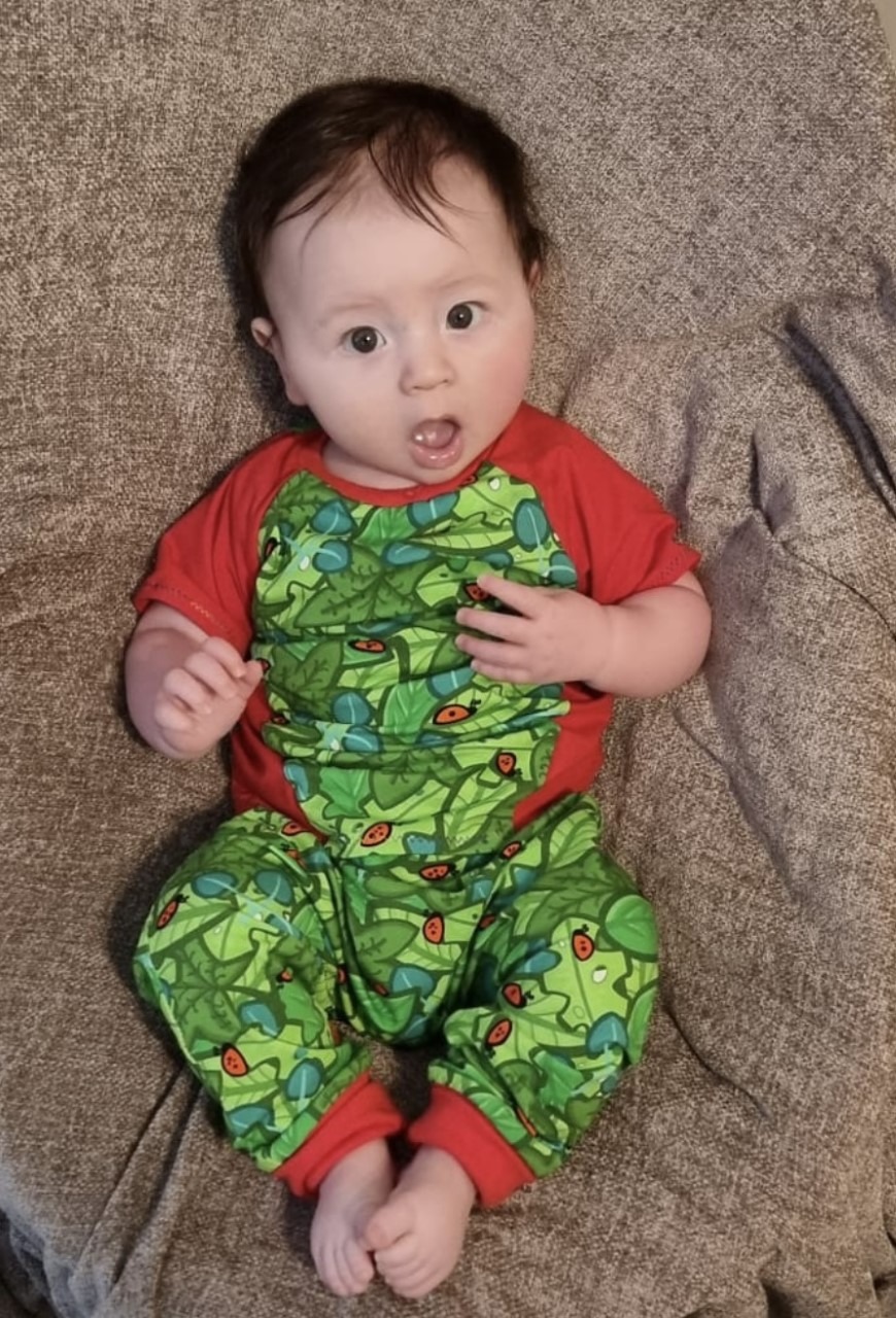 Arthur modelling the ladybirds and leaves outfit