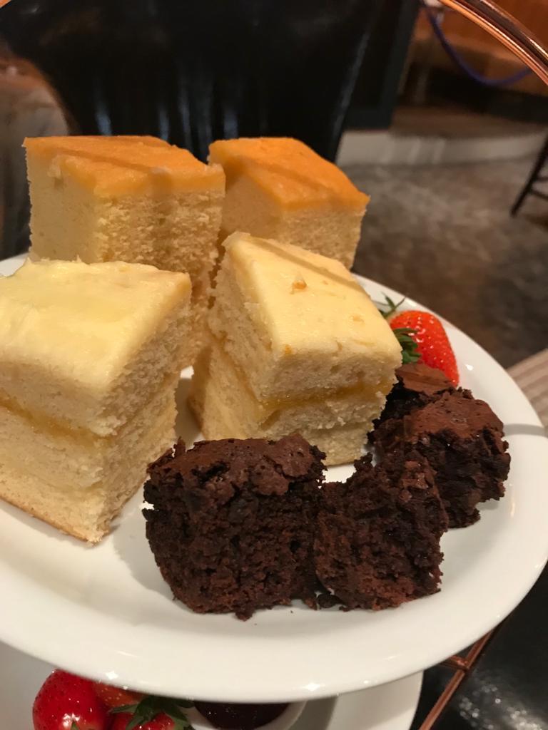 The lemon cake and Victoria sponge come with miniature chocolate brownies