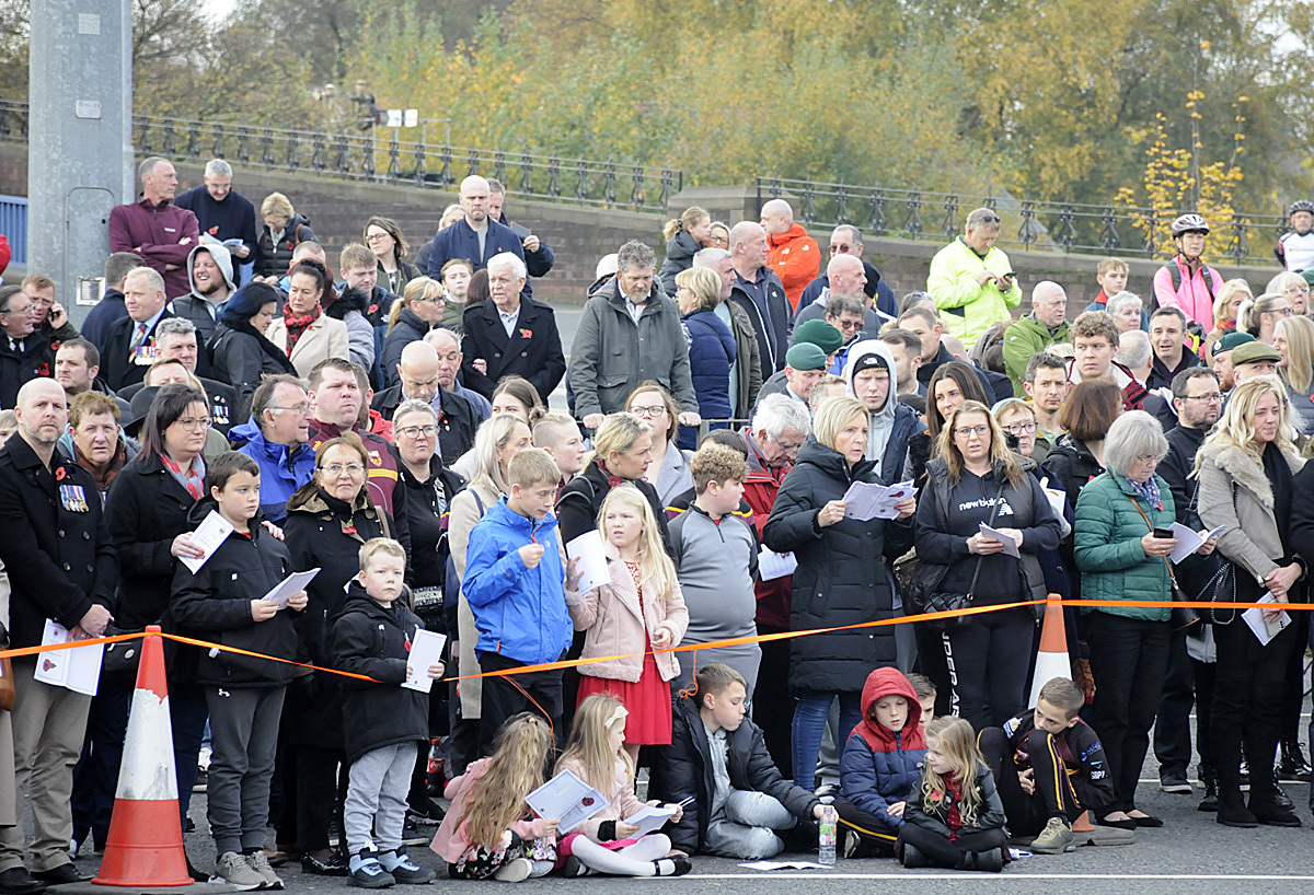 Residents gather at Warrington Cenotaph for the service. Picture: Mike Boden