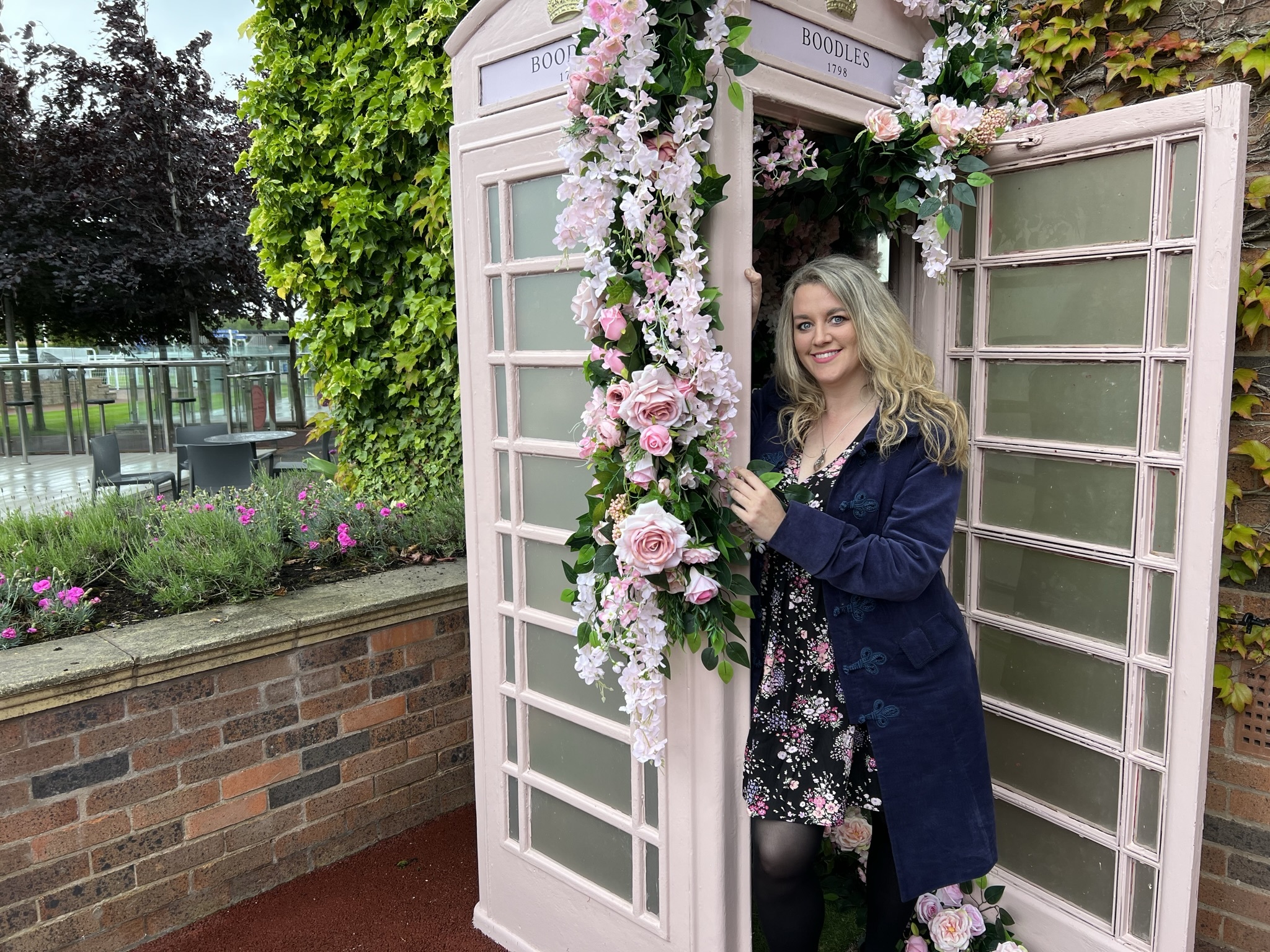 Emma has had some unusual projects like adding floral decorations to this old phone box