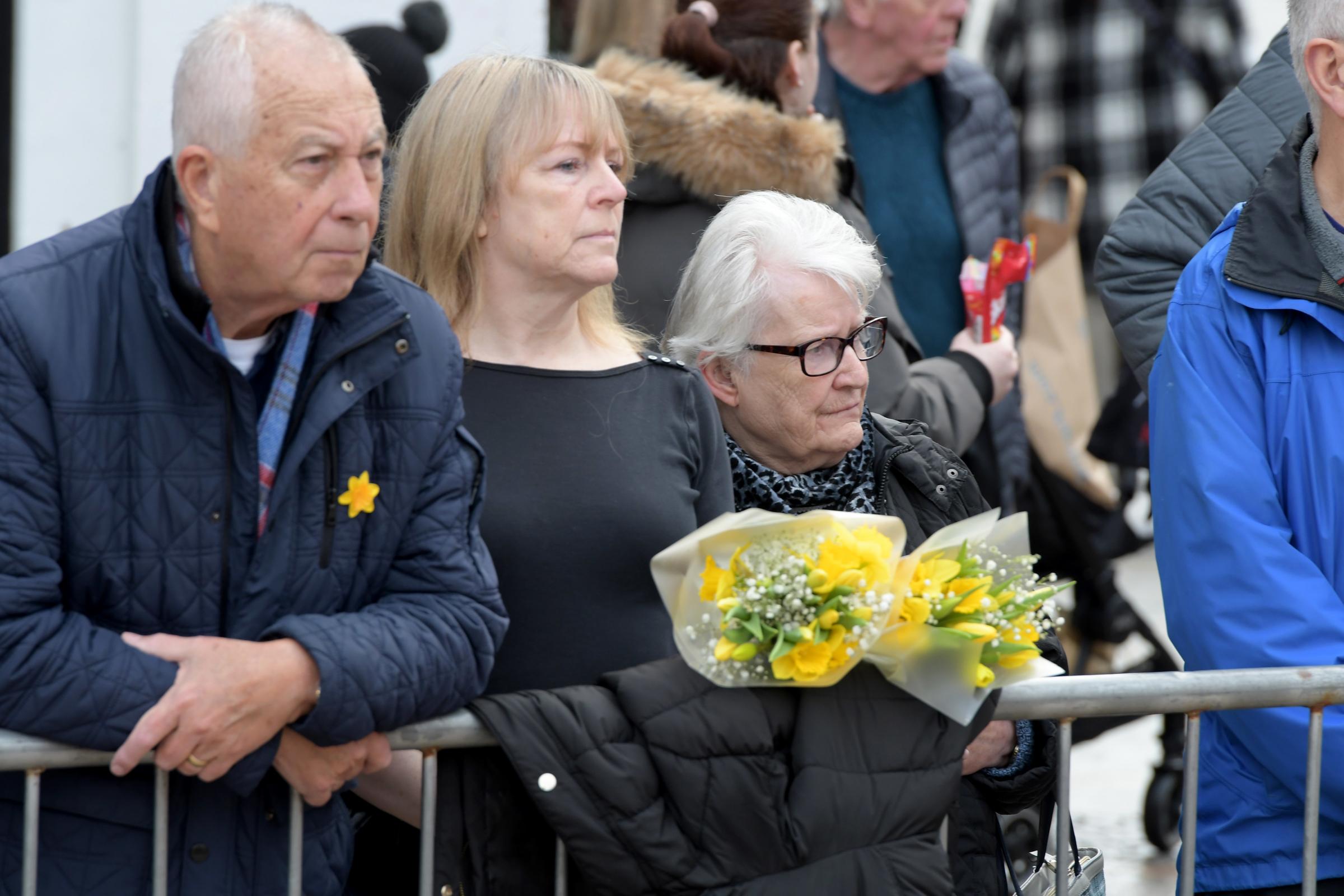 Residents in the town centre pay their respects