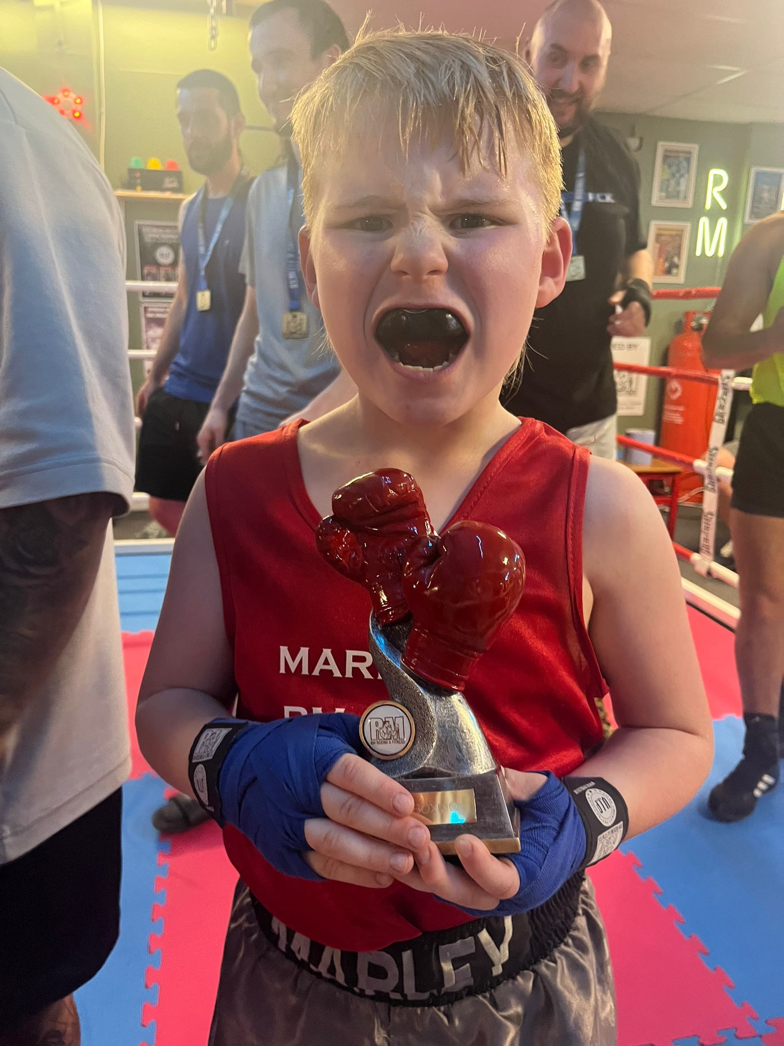 Daniels son Marley after an exhibition bout