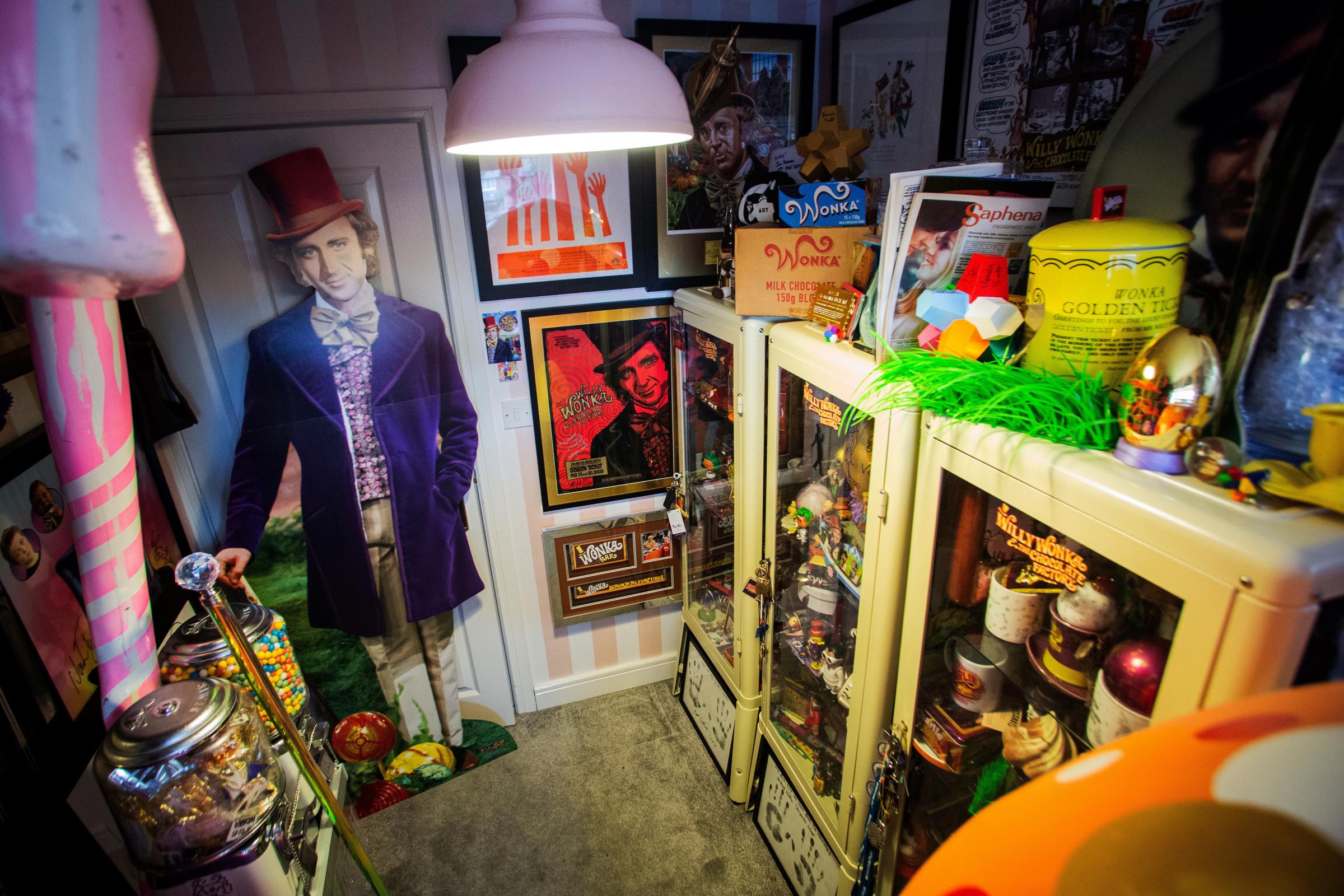 Nick Anderton with his Willy Wonka collection. Picture: SWNS