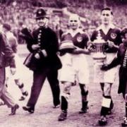 Freddie Worrall holding the base of the FA Cup in Portsmouth's 1939 win at Wembley