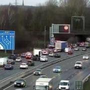 Drivers faced queues and a lane closure on the M62 following a crash involving two cars and a van
