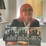Isobel Wycherley with her books