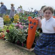 Croft Primary School pupil Mia Lonsdale on the allotment at the RHS Tatton Flower Show