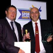 Chris Ball, right, receives his award from Alan Burton, of the Twenty Four Seven design company