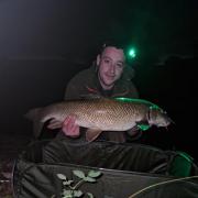 Mike Chris with one of the four barbel he caught while fishing the River Ribble