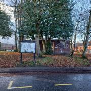 The word 'slim' has been spray painted across many places within the Latchford and Walton area