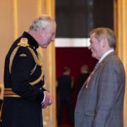 Tommy Spedding met the King during a ceremony where he received an OBE