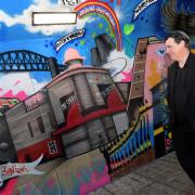 An underpass in the town centre has been given a new lease of life thanks to youngsters and a local artist