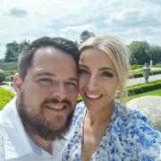 Adam Robertson and Selina Bacon were unable to go on their first international holiday together due to a passport regulation from the EU.