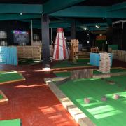Take a look inside a new venue in town offering crazy golf, axe throwing, and more