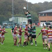 Rhys Lilley winning a lineout for Lymm at Fylde