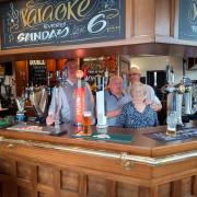 Chris Sherman, Mark Sherman, Anne Hilton, and Alan Hilton who took over the pub