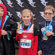 Warrington Athletics Club's medal winners at the Run Through Heaton Park event
