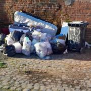 Mounds of rubbish dumped on Lovely Lane