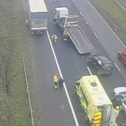 Lanes closed and queues building following crash on M56