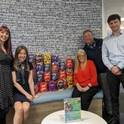 Miller Homes staff with the Easter eggs ready to donate to CAFT