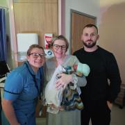 Fourth time parents Jessica and Luke welcome Cillian with midwife Karyn Lowe
