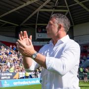 Sam Burgess salutes the Wire fans after the Challenge Cup semi-final win