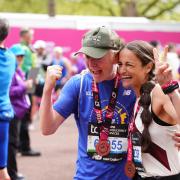 Chris Evans with wife Natasha Shishmanian after finishing the London Marathon. Picture: PA