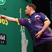 Luke Littler in action during the US Darts Masters at New York's Madison Square Garden