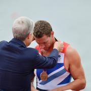 Richard Egington receives his bronze medal. Pictures by Jessica Mann
