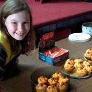 Zoe Povey with her fundraising cakes
