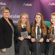 From l-r: Teacher Amanda Silver with the three winning artists Lily Ward, Darcy Nolan, Ellie Griffiths