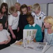 Pupils at Mill Green School learn some tips of the journalist trade 	dth230408