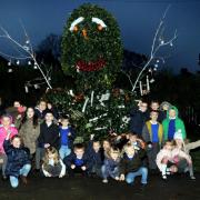 Youngsters from the Wasps group decorated the holly bush at Alexandra Park