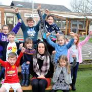 Beth Tweddle with youngsters at the school