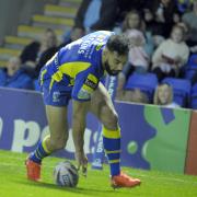 One of two Warrington Wolves tries for Ryan Atkins against Leeds Rhinos. Picture by Mike Boden