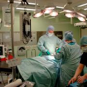 Surgeons perform a spine operation at Warrington Hospital