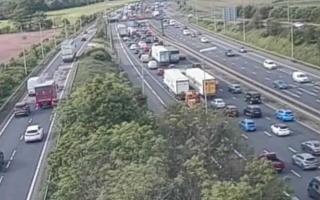 A lorry has shed its load on the M6 outside Warrington