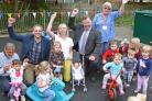 Alex Cain, York’s UFO head of programme delivery, Helen Fletcher,  marketing manager at York’s UFO, Cllr Andrew Waller, and Jean Forrester, treasurer at Foxwood Community Centre, with parents and children in the new play area at Foxwood Community Cen