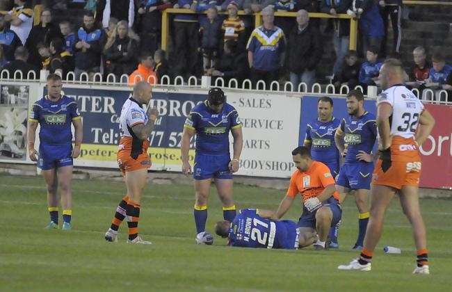 Mitch Brown is treated for the injury he suffered against Castleford. Picture by Mike Boden